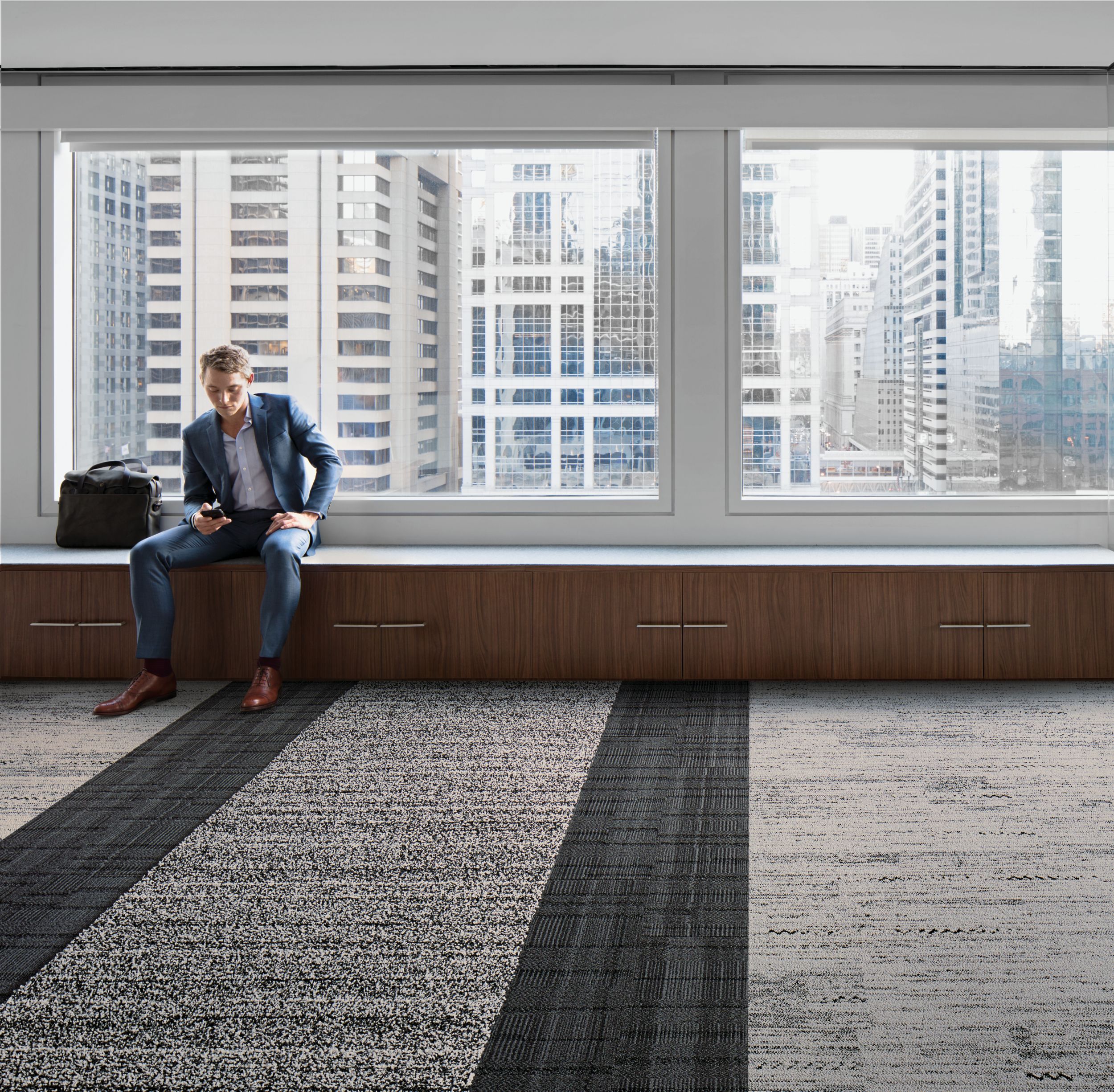 Interface Darning, Stitch Count, and Overedge plank carpet tile in room with man seated by window imagen número 5